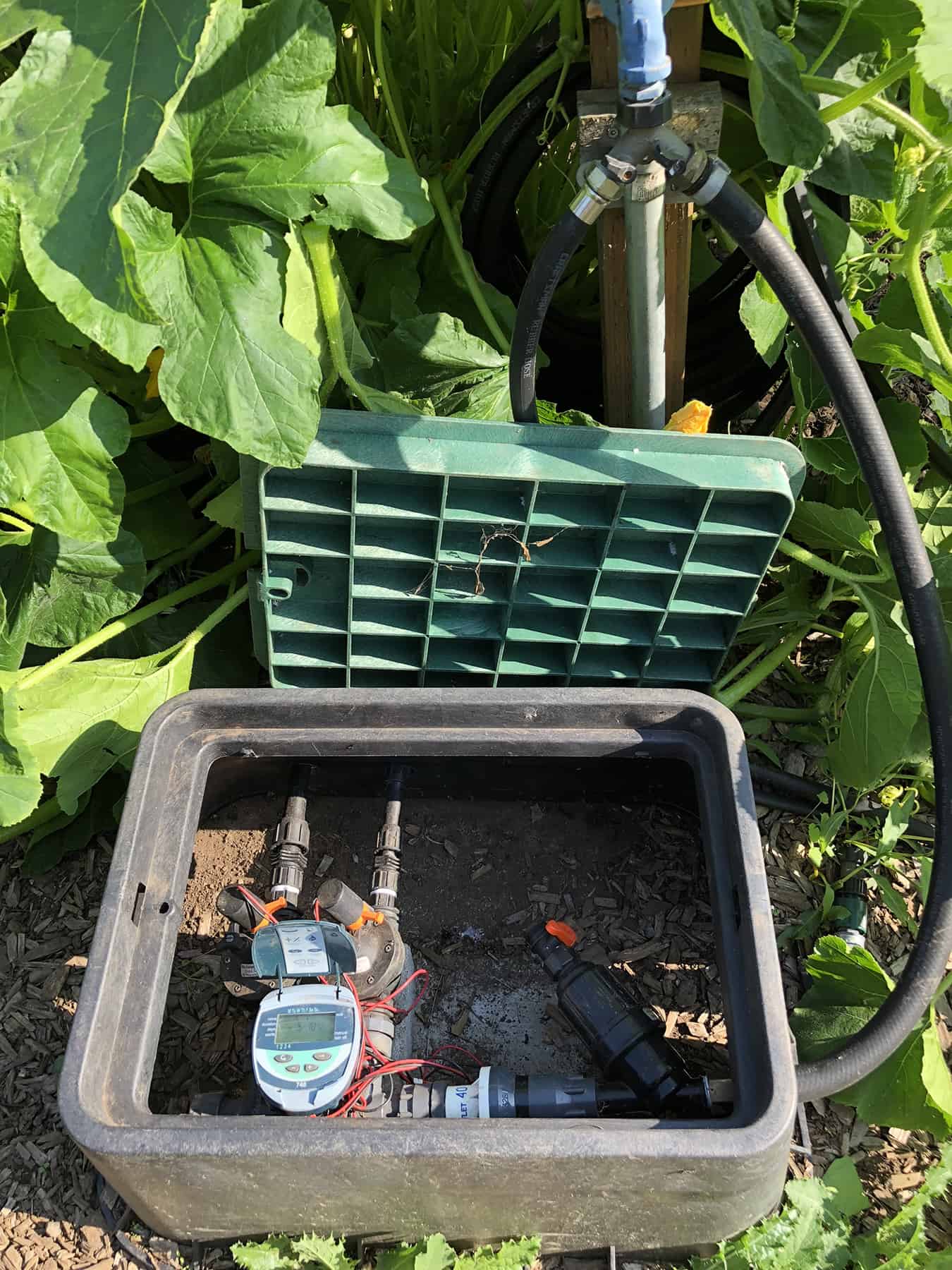 This image shows the manifold system described in the last photo connected to a frost-proof yard hydrant by a high pressure hose. © Photo Robert Bryan