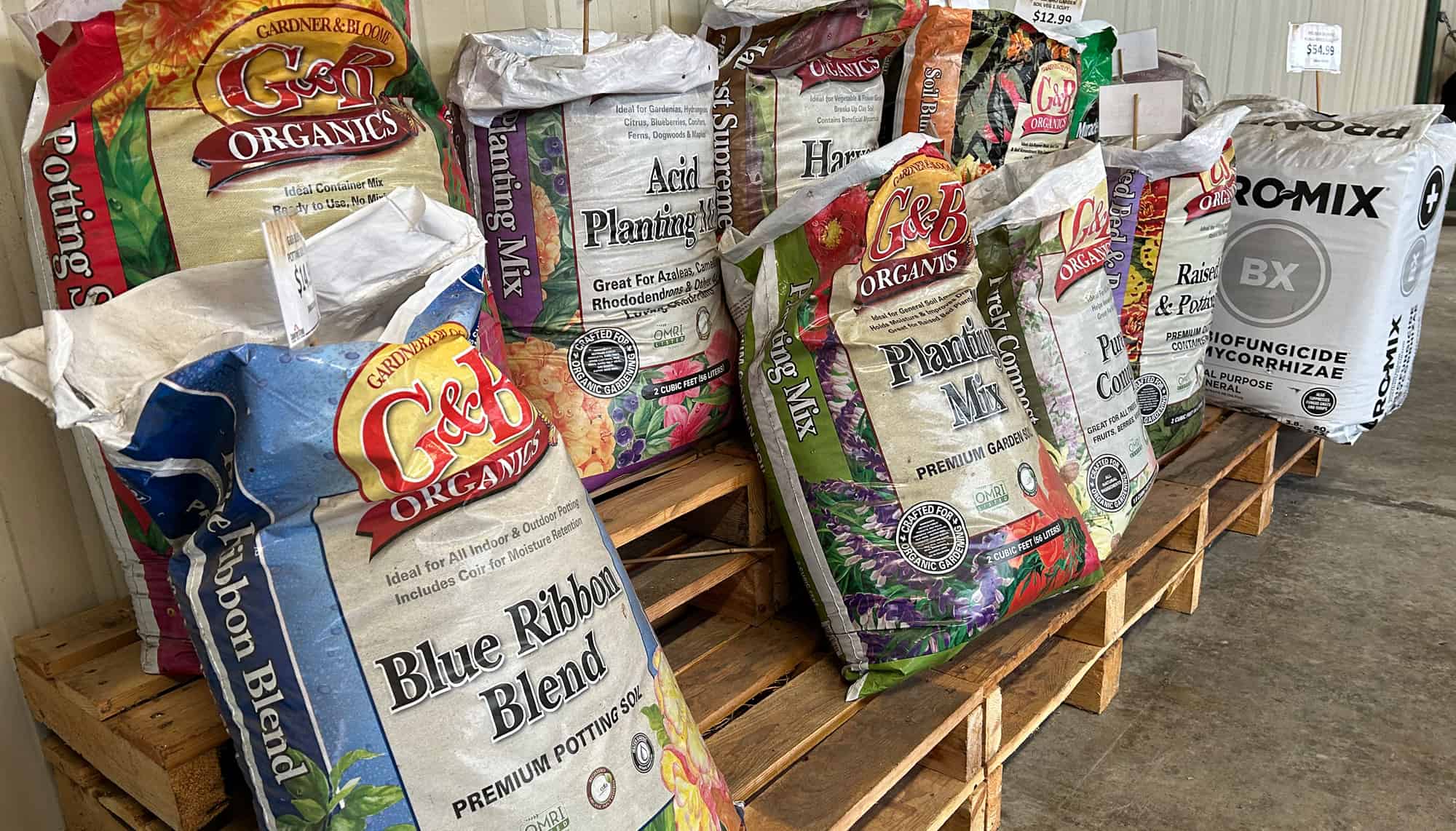 Bags of potting soil on store pallets