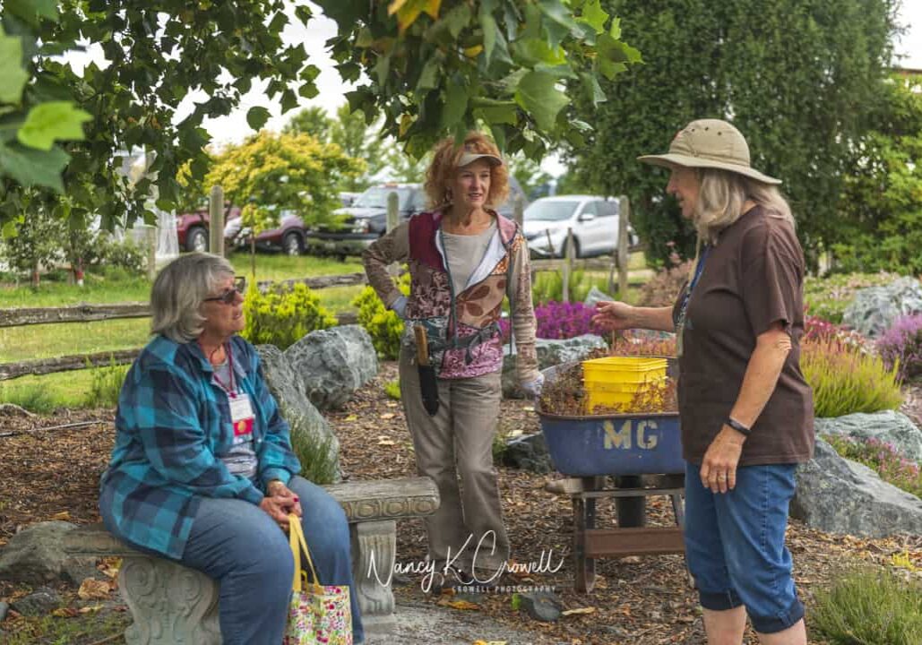 Gardening provides the camaraderie of sharing a goal working with our children, family, or gardening friends. © Nancy Crowell Photography
