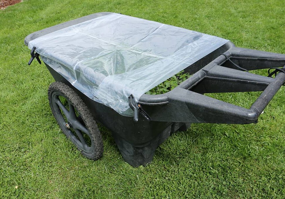 111723_pic4 By loosely laying plastic over the garden cart in the evening, some of the heat captured is heat is retained into the evening hours. Photo © Kay Torrance