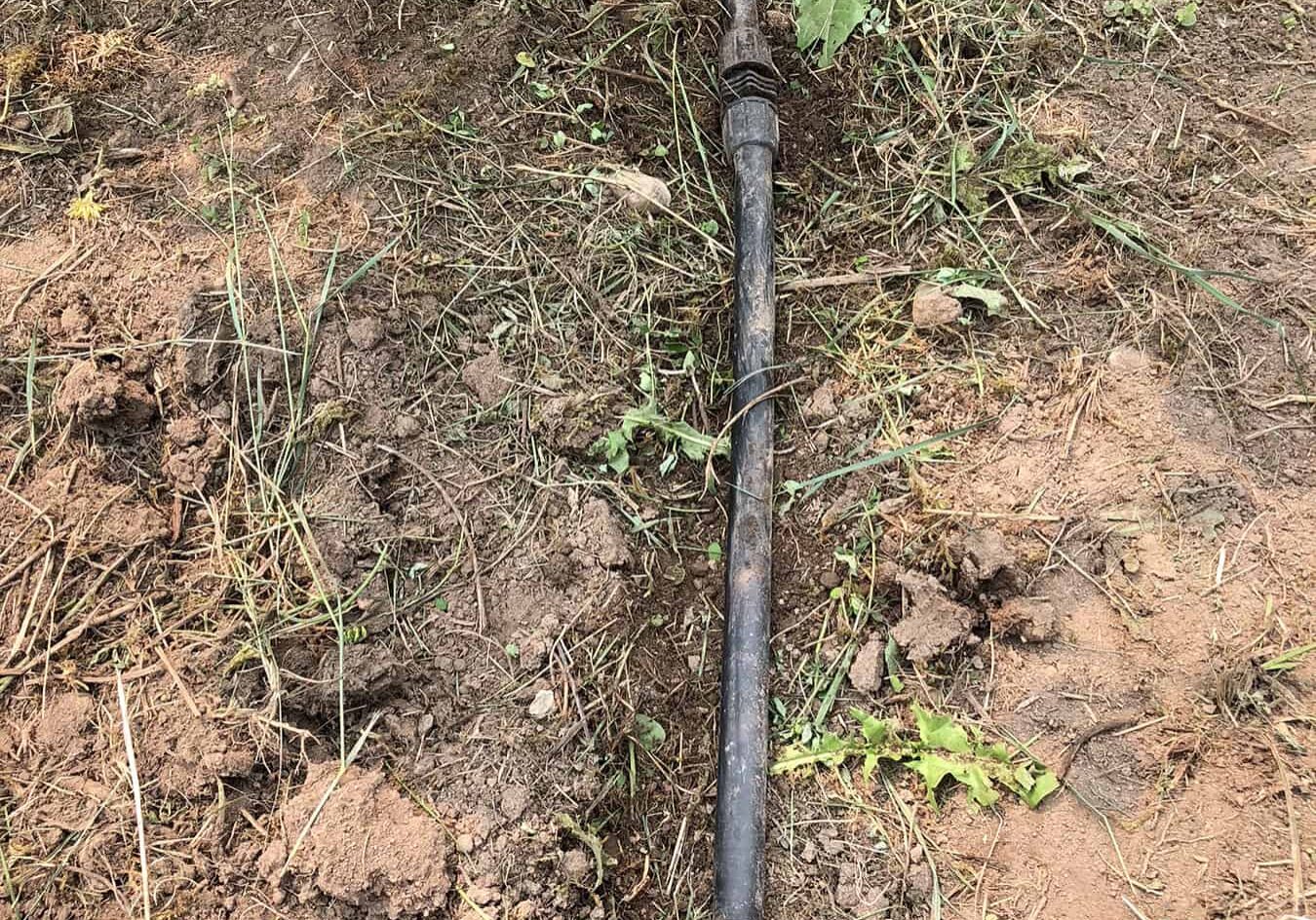 A 1/2” mainline with multiple repairs illustrating the result of burying drip lines under mulch. Such hidden lines are invariably severed by weeding activity. © Bob Bryan